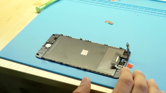 Repairing and Changing of a Screen on a iPhone Mobile Phone