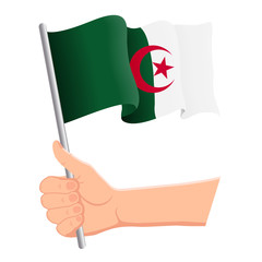 Hand holding and waving the national flag of Algeria. Fans, independence day, patriotic concept. Vector illustration, eps 10.
