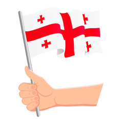 Hand holding and waving the national flag of Georgia. Fans, independence day, patriotic concept. Vector illustration, eps 10.