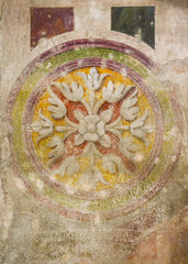 Old fresco on a wall in a church in Switzerland