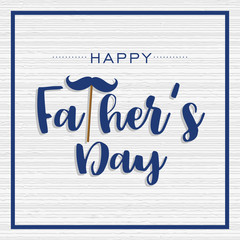 Happy Father's Day lettering on wooden background.
