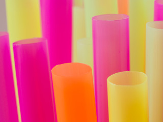 Close-up of colorful plastic straws.