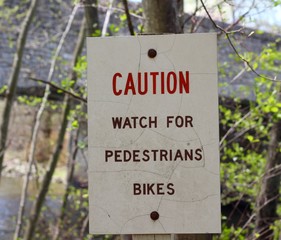 A close view of the caution sign.