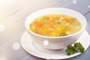 Bowl of vegetables delicious soup, close-up view