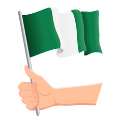 Hand holding and waving the national flag of Nigeria. Fans, independence day, patriotic concept. Vector illustration, eps 10.