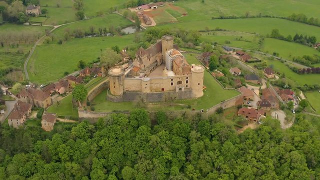Castle of Castelnau-Bretenoux stands on the edge of a rocky plateau which here forms a spur due to a natural fault in the bedrock.Quercy region, Prudhomat, Lot department in southern France