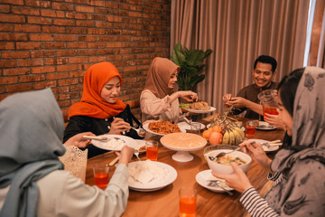 Family together in the dining room, a moments together with family before breaking their fast