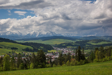 Fototapeta premium Snow capped peaks of the Tatras in spring seen from Niedzica, Malopolskie, Poland