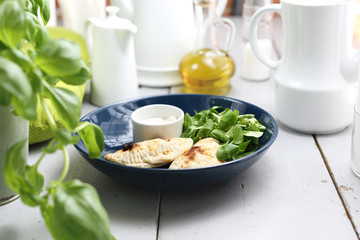 Appetizer. Crunchy stuffed calzone with garlic yoghurt sauce.