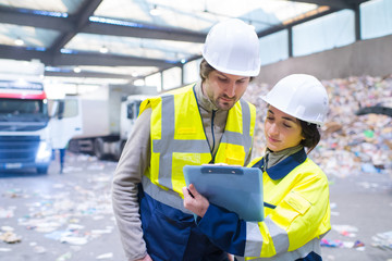 workers at recycling plant