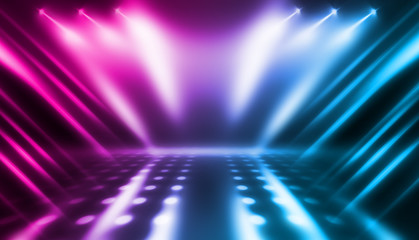 Background of empty stage show. Neon blue and purple light and laser show. Laser futuristic shapes on a dark background. Abstract dark background with neon glow