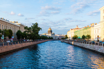 Beautiful view of the Moyka River and historic buildings from the Potseluev bridge, Saint Petersburg, Russia