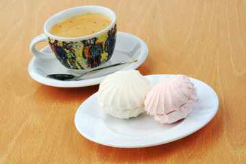 Falling vanilla marshmallow, traditional russian zephyr isolated on wooden background