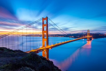 Fototapeta na wymiar Lovely Golden Gate Bridge Long Exposure Panoramic Photo at Sunrise