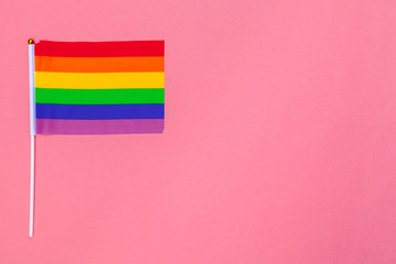 LGBT day concept. LGBT flag on the table.