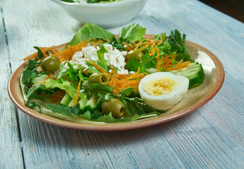 Spring salad with herbs, vegetables and eggs