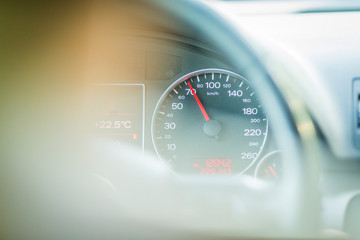 car dashboard and speedometer. kilometer of a car driving at 70, 80, 90 km / h. 