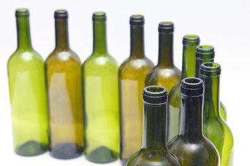 empty bottles of wine on white background. tableware for drinks.
