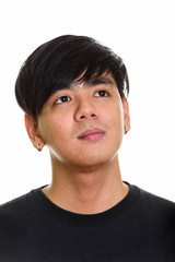 Obraz premium Face of cool handsome Asian man thinking