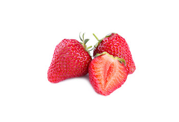 Three ripe trawberries isolated on a white background