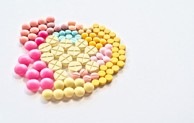 Abstract colorful drug pills on plain background of medicine is capsule ,tablet in pharmacy that...