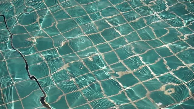 ripple water in swimming pool in summer