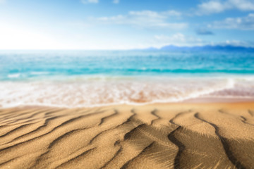 Fototapeta na wymiar Summer background of sand on beach and palms shadow 