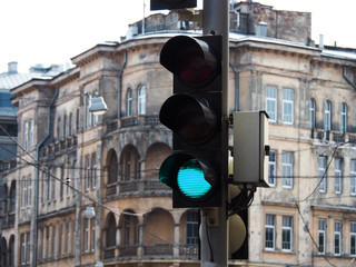 Green signal traffic lights in a European city