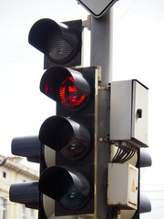 Red light traffic light for pedestrians with a turn