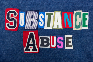SUBSTANCE ABUSE text word collage, colorful fabric on blue denim, addiction and abuse concept, horizontal aspect