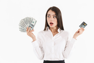Photo of happy female worker businesswoman dressed in formal wear holding cash money and credit...