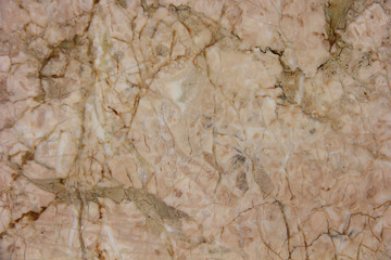texture of smooth brown marble or tile surface with cracks, patterns and divorces