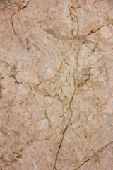 texture of smooth brown marble or tile surface with cracks, patterns and divorces