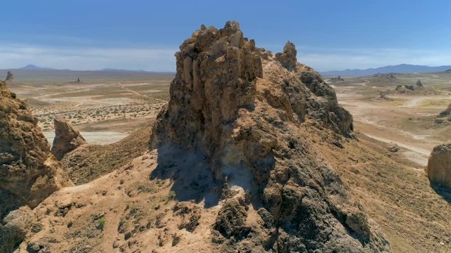 TRONA PINNACLES, CALIFORNIA, USA. Aerial 4K view of the awesome valley with pinnacles. Tufa spires in the desert.