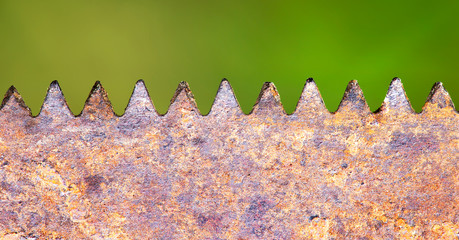 Hand tool, equipment - web banner of a rusty saw blade close-up