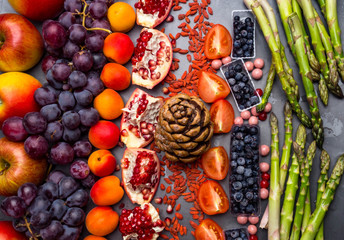 Health food for fitness concept with fruit, vegetables, nuts High in anthocyanins, antioxidants, minerals and vitamins
