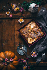 Pumpkin Pie with Apple and Cinnamon on wooden vintage background