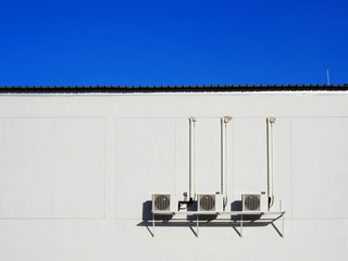 air conditioner compressor outdoor units on the terrace of the building