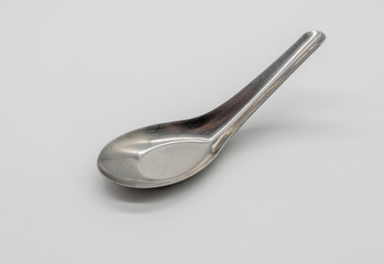 Used silver short spoon isolated on white