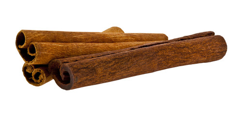 Cinnamon sticks isolated on white background close up