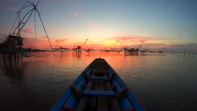 View  Sunrise at Sri Pak Pra Fishing Traditional Local Fishing Trap also Known as Yor Building at Pakpra Thale Noi Lake in Phatthalung province Thailand