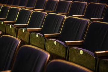 the auditorium with seats, chairs in the auditorium