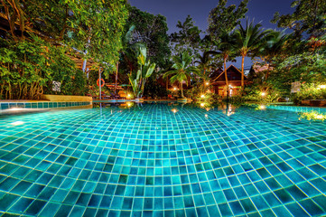 Tropical gardens around a swimming pool in Pattaya, Thailand