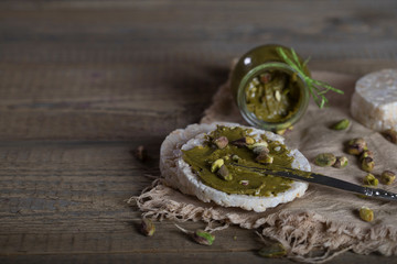 Pistachio nut butter creamed on a slice of rice crispbread.