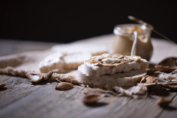 Homemade almond butter on a slice of rice crispbread.