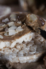 Homemade almond butter on a slice of rice crispbread.