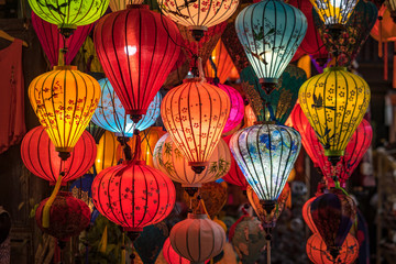 Fototapeta na wymiar Colorful traditional Chinese lantern or light lamp to decorate street at night, there are famous things of Hoi An - the heritage ancient city of Vietnam.