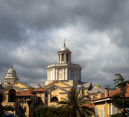 Landscape Dome of Porto maurizio with cloudy sky, palma and houses