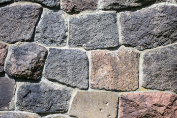 old stone boulder wall granite