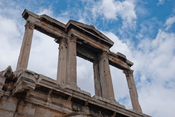 Fototapeta premium Hadrian's Gate at the ancient temple of Olympius Zeus or Olympion, near the Acropolis of Athens, Greece / May 2019. 